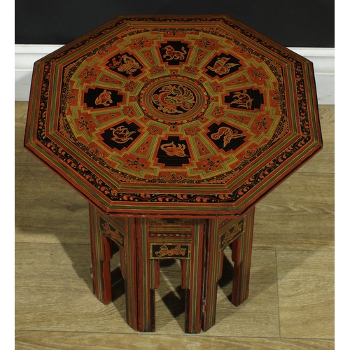 1365 - A near pair of Burmese red lacquer Hoshiarpur tables, decorated throughout in the traditional manner... 