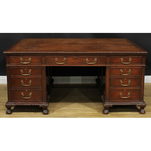 1287 - A large George III Revival mahogany partners’ desk, rectangular top with gadrooned edge and inset to... 