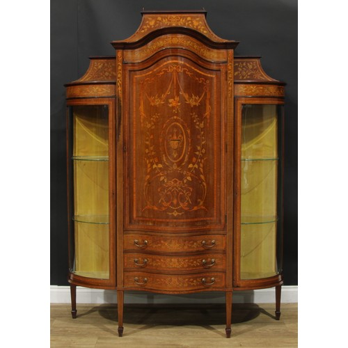 1136 - A Sheraton Revival satinwood banded mahogany and marquetry display cabinet, caddy top above a serpen... 