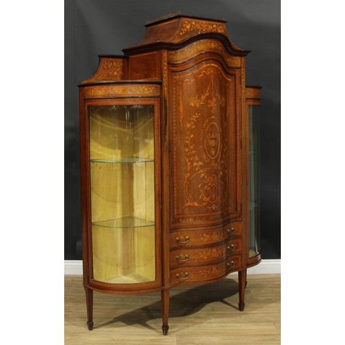 1136 - A Sheraton Revival satinwood banded mahogany and marquetry display cabinet, caddy top above a serpen... 