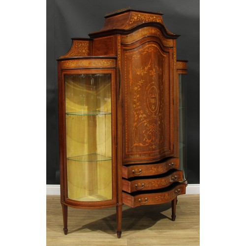 1136 - A Sheraton Revival satinwood banded mahogany and marquetry display cabinet, caddy top above a serpen... 