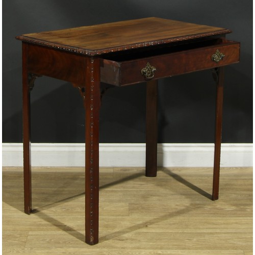 1051 - A Chippendale Revival mahogany side table, rectangular top with gadrooned edge above a long cockbead... 