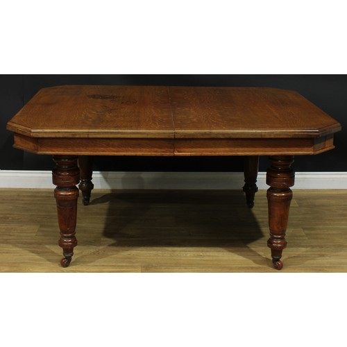 1336 - A late Victorian oak dining table, canted rectangular top, turned legs, ceramic casters, 74cm high, ... 