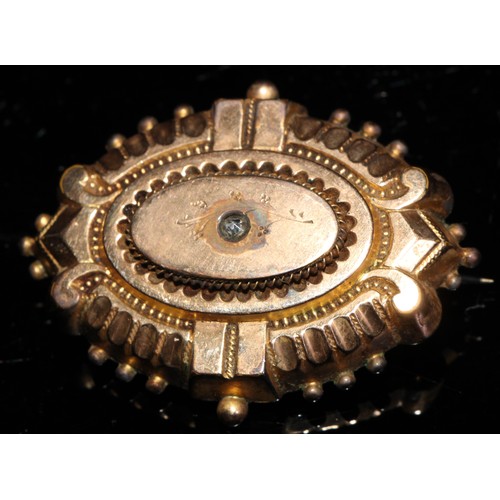 348 - A late 19th century 9ct gold oval target brooch, 3cm, steel pin, marked 9ct, 2.5g; a 10ct gold plate... 