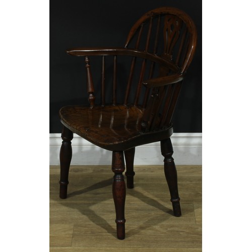 1008 - A 19th century yew and elm miniature Windsor elbow chair, hoop back, shaped and pierced splat, turne... 