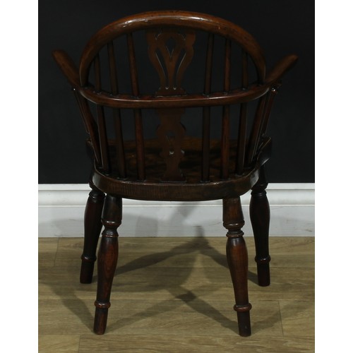 1008 - A 19th century yew and elm miniature Windsor elbow chair, hoop back, shaped and pierced splat, turne... 