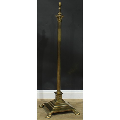 1622 - Interior Design - a brass floor lamp, Corinthian column, stepped square base, paw feet, 131cm high o... 