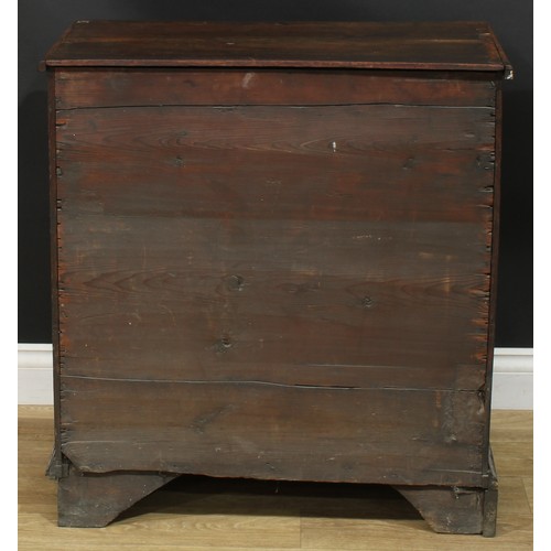 1089 - A George I/II oak chest, of small proportions, slightly oversailing top above two short and three lo... 