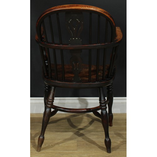 1374 - A pair of 19th century yew, elm and ash Windsor elbow chairs, each with a low hoop back, shaped and ... 