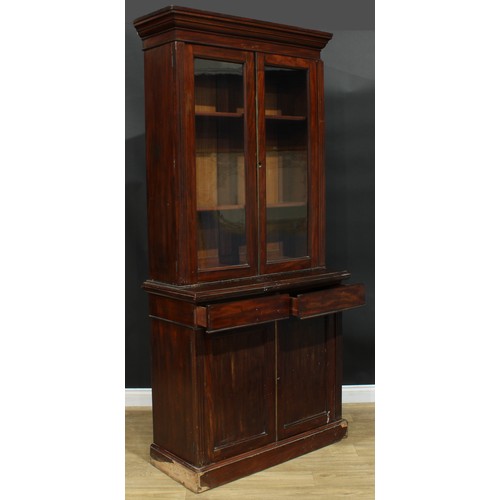 928 - A 19th century mahogany library bookcase, moulded cornice above a pair of glazed doors enclosing she... 