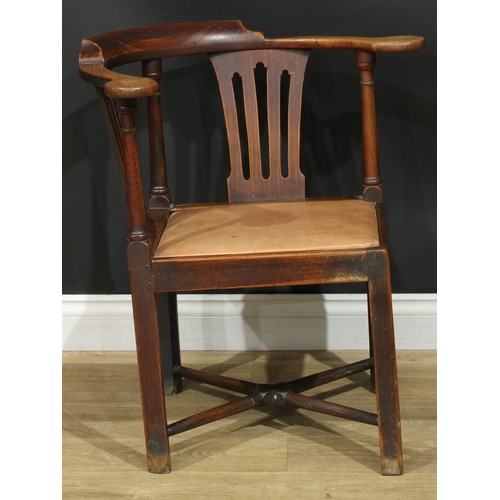 1002 - A 19th century vernacular ash, beech and elm corner chair, shaped and pierced splats, turned support... 