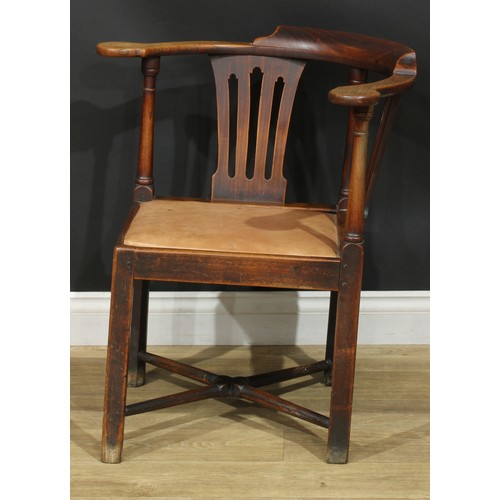 1002 - A 19th century vernacular ash, beech and elm corner chair, shaped and pierced splats, turned support... 