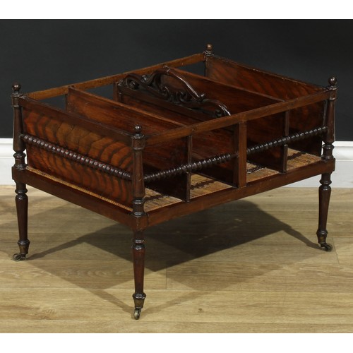 892 - A 19th century Colonial four section Canterbury, bobbin-turned side rails, wicker base, turned legs,... 