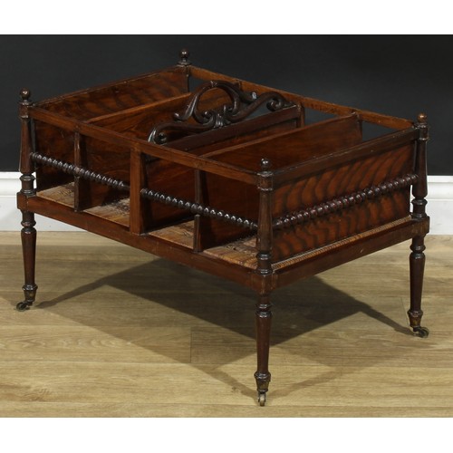 892 - A 19th century Colonial four section Canterbury, bobbin-turned side rails, wicker base, turned legs,... 