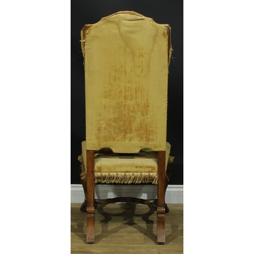 1125 - A set of six Baroque Revival walnut dining chairs, tall backs with shaped arched crestings, cabriole... 