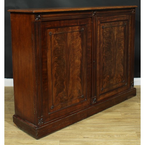 929 - A 19th century mahogany low press cupboard, rectangular top with moulded edge above a pair of panel ... 