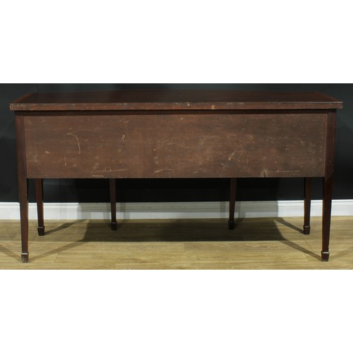 1445 - A Sheraton Revival satinwood crossbanded mahogany serpentine sideboard, slightly oversailing top abo... 