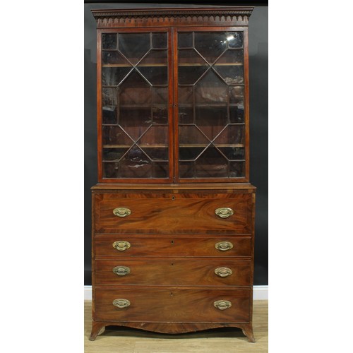 1226 - A George III mahogany secretaire bookcase, outswept cornice above a pair of astragal glazed doors en... 