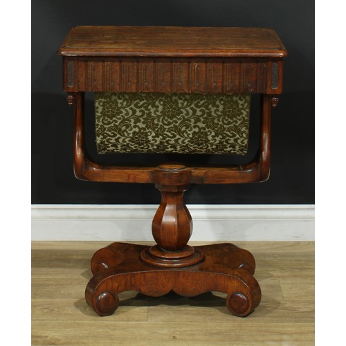 948 - A 19th century oak work table, rounded rectangular top with moulded edge above a frieze drawer and b... 