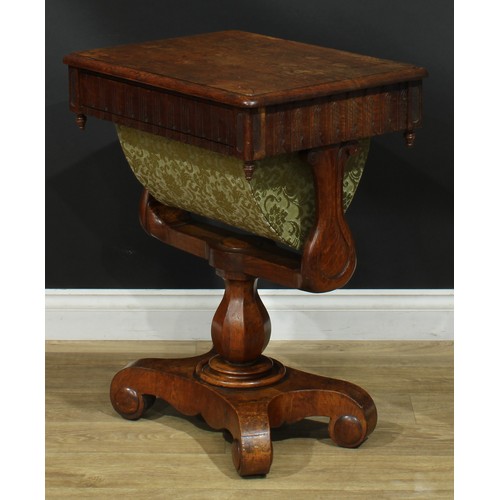 948 - A 19th century oak work table, rounded rectangular top with moulded edge above a frieze drawer and b... 