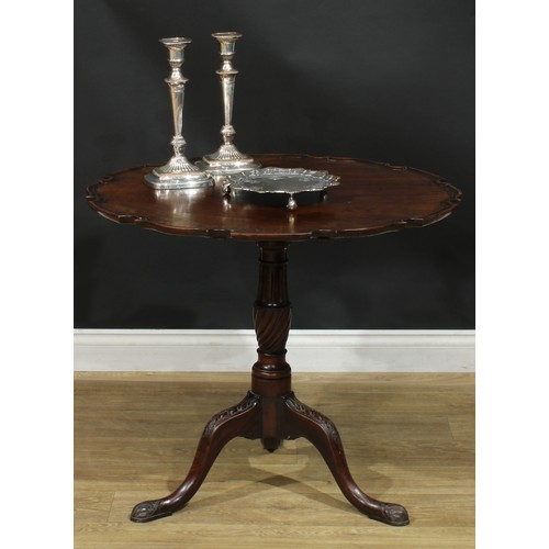 936 - A 19th century mahogany tripod occasional table, dished pie-crust tilting top, turned and fluted col... 