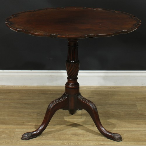 936 - A 19th century mahogany tripod occasional table, dished pie-crust tilting top, turned and fluted col... 