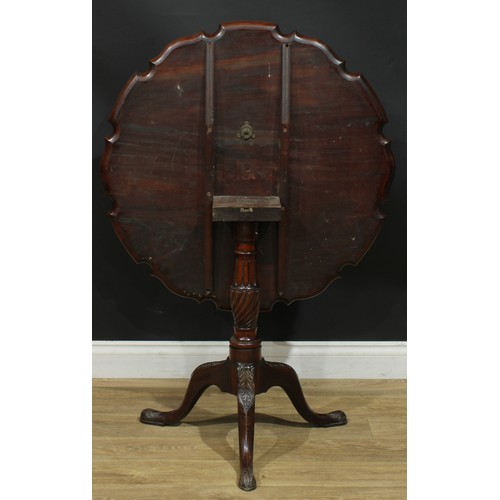 936 - A 19th century mahogany tripod occasional table, dished pie-crust tilting top, turned and fluted col... 