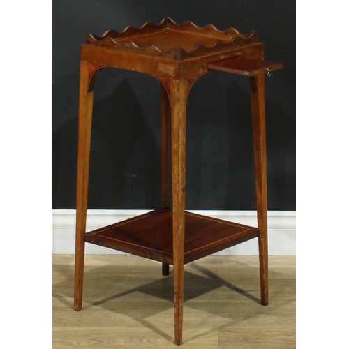 1175 - A George III Revival mahogany kettle stand, square top with wavy gallery, above a slide, batwing bra... 