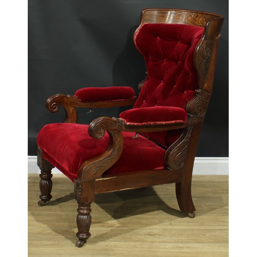 1006 - A 19th century walnut and marquetry reclining armchair, curved cresting rail inlaid with swans and l... 