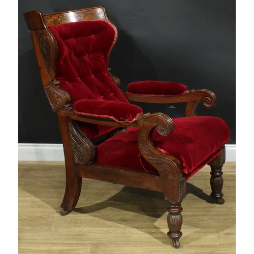 1006 - A 19th century walnut and marquetry reclining armchair, curved cresting rail inlaid with swans and l... 