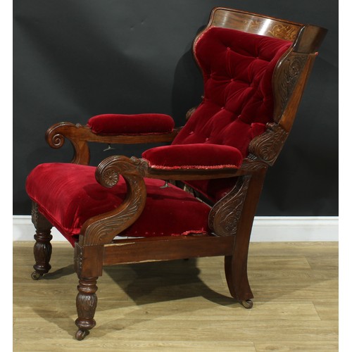 1006 - A 19th century walnut and marquetry reclining armchair, curved cresting rail inlaid with swans and l... 