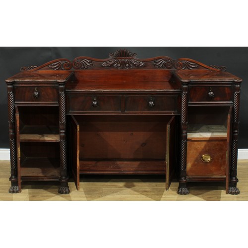 1416 - A Post-Regency mahogany sunken-centre serving table or sideboard, shaped half gallery carved with sc... 