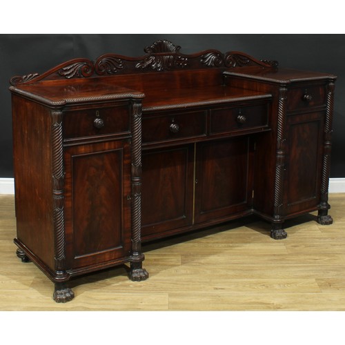 1416 - A Post-Regency mahogany sunken-centre serving table or sideboard, shaped half gallery carved with sc... 