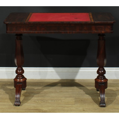 911 - A 19th century mahogany architect’s drafting or writing table, rounded rectangular top with angle-ad... 