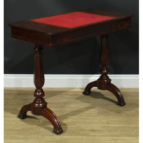 911 - A 19th century mahogany architect’s drafting or writing table, rounded rectangular top with angle-ad... 