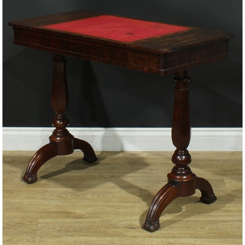 911 - A 19th century mahogany architect’s drafting or writing table, rounded rectangular top with angle-ad... 