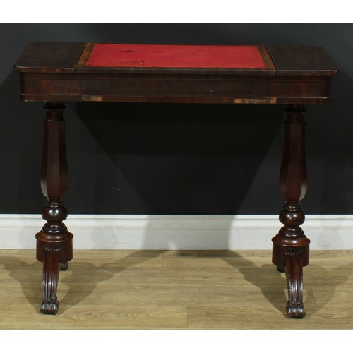 911 - A 19th century mahogany architect’s drafting or writing table, rounded rectangular top with angle-ad... 