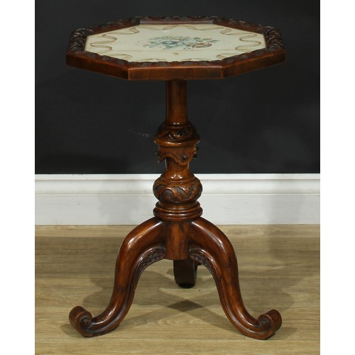 1411 - A pair of Victorian walnut tripod occasional tables, each with an octagonal top with inset glazed wa... 