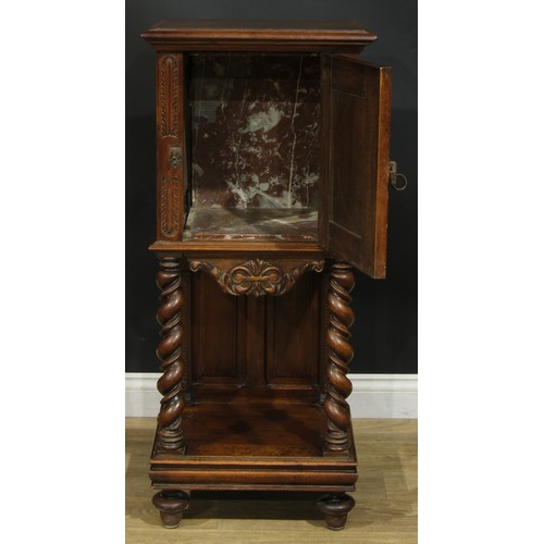 1322 - A late 19th century French bedroom night cupboard, rectangular top with moulded edge above a panel d... 