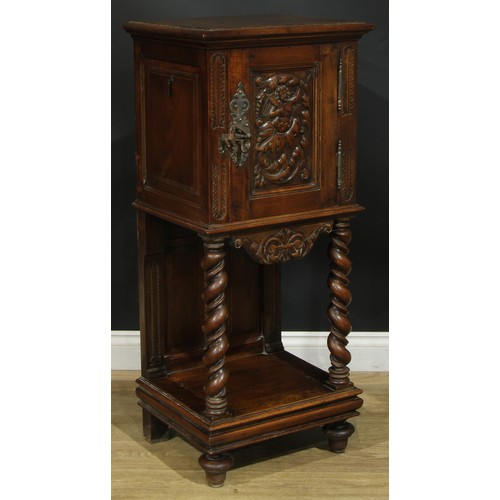 1322 - A late 19th century French bedroom night cupboard, rectangular top with moulded edge above a panel d... 