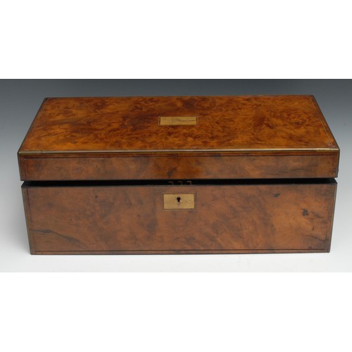 1260 - A large Victorian walnut rectangular writing box, hinged cover enclosing an inset tooled and gilt le... 