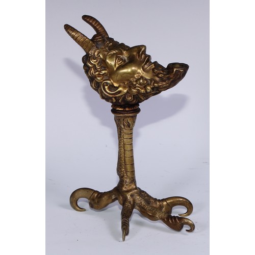 206 - A Renaissance Revival gilt bronze lamp, cast as the head of Pan, raised on a talon support, 20cm hig... 