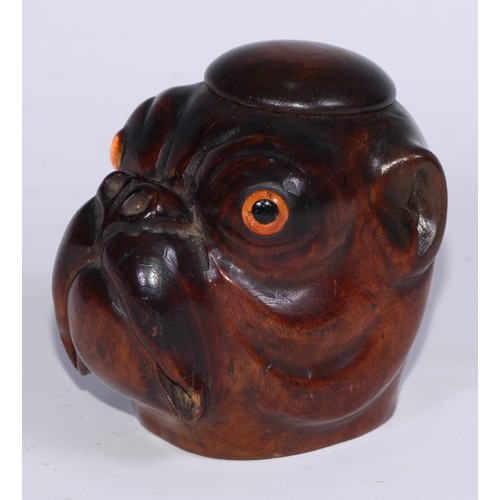 1073 - A Black Forest novelty table snuff box or inkwell, carved as the head of a bulldog, domed cover, gla... 