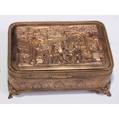 1248 - A French gilt metal rounded rectangular table casket, hinged cover with electrotype panel in the man... 