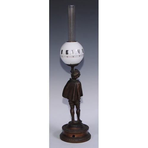 963 - A 19th century figural night clock, opaque glass globe inscribed with Roman numerals, the patinated ... 