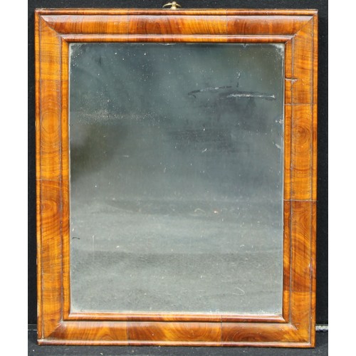 1360 - An 18th century walnut rectangular looking glass, plain mirror plate, cushion moulded frame, 48cm hi... 