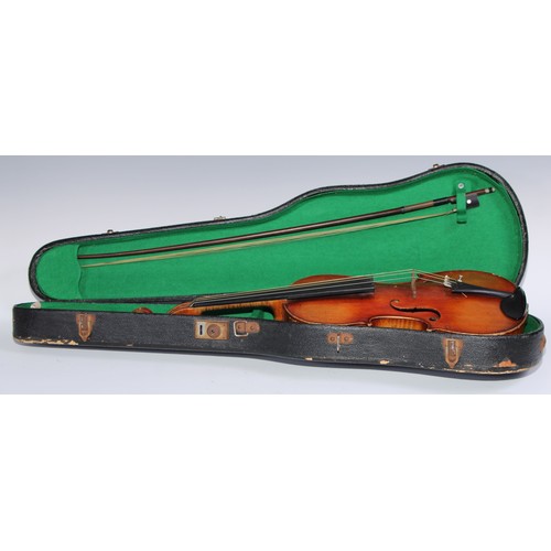 842 - A violin, the two-piece back 36cm excluding button, outlined throughout with purfling, 60cm long ove... 