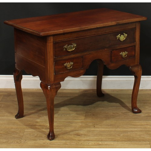 1095 - A George II Revival mahogany lowboy or side table, rectangular top with moulded edge above one long ... 