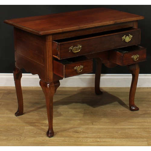 1095 - A George II Revival mahogany lowboy or side table, rectangular top with moulded edge above one long ... 