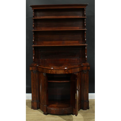 898 - A 19th century flame mahogany library bookcase side cabinet, outswept cornice above three waterfall ... 